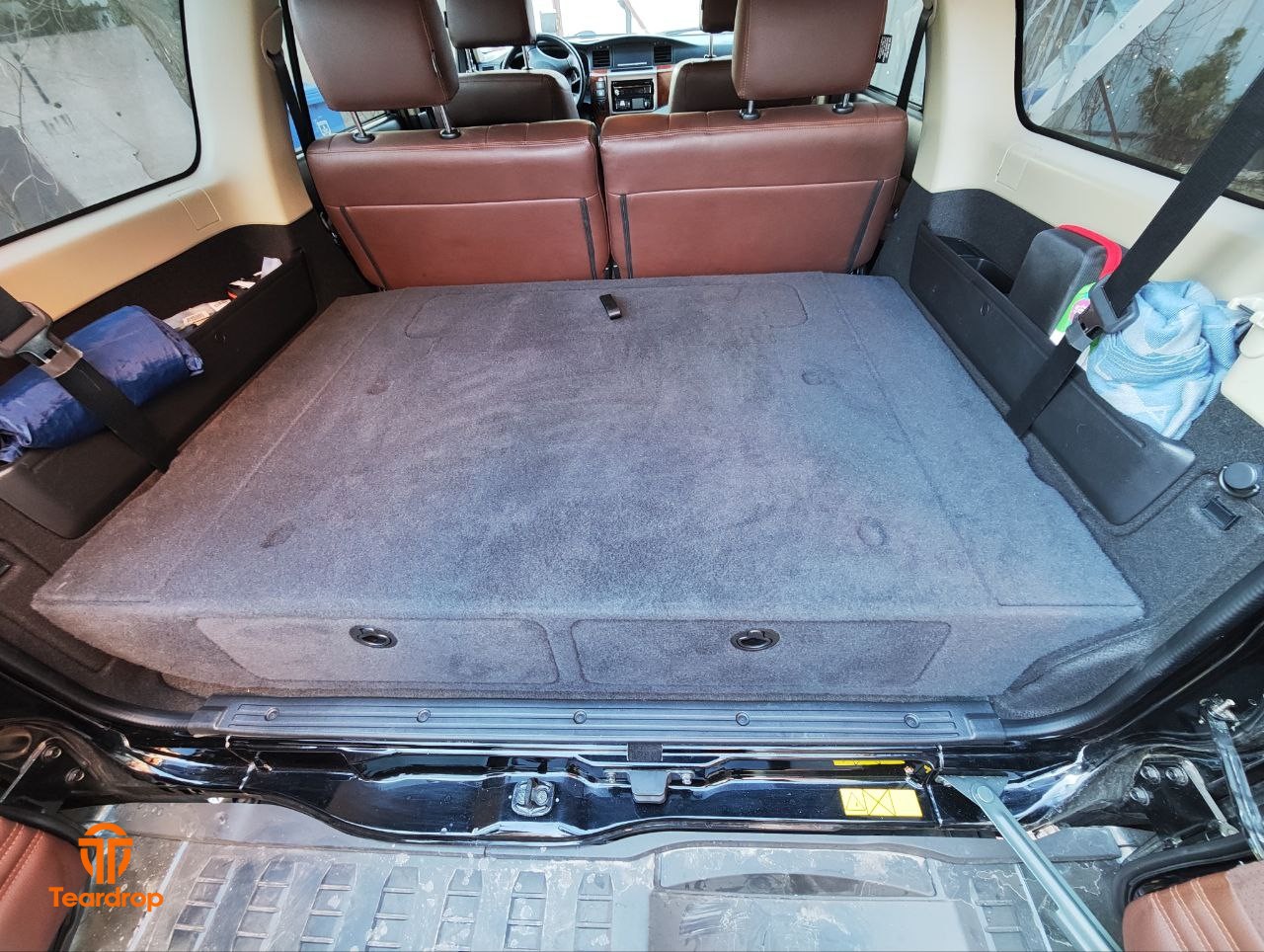 Спальне місце в Nissan Patrol Y61 з органайзером